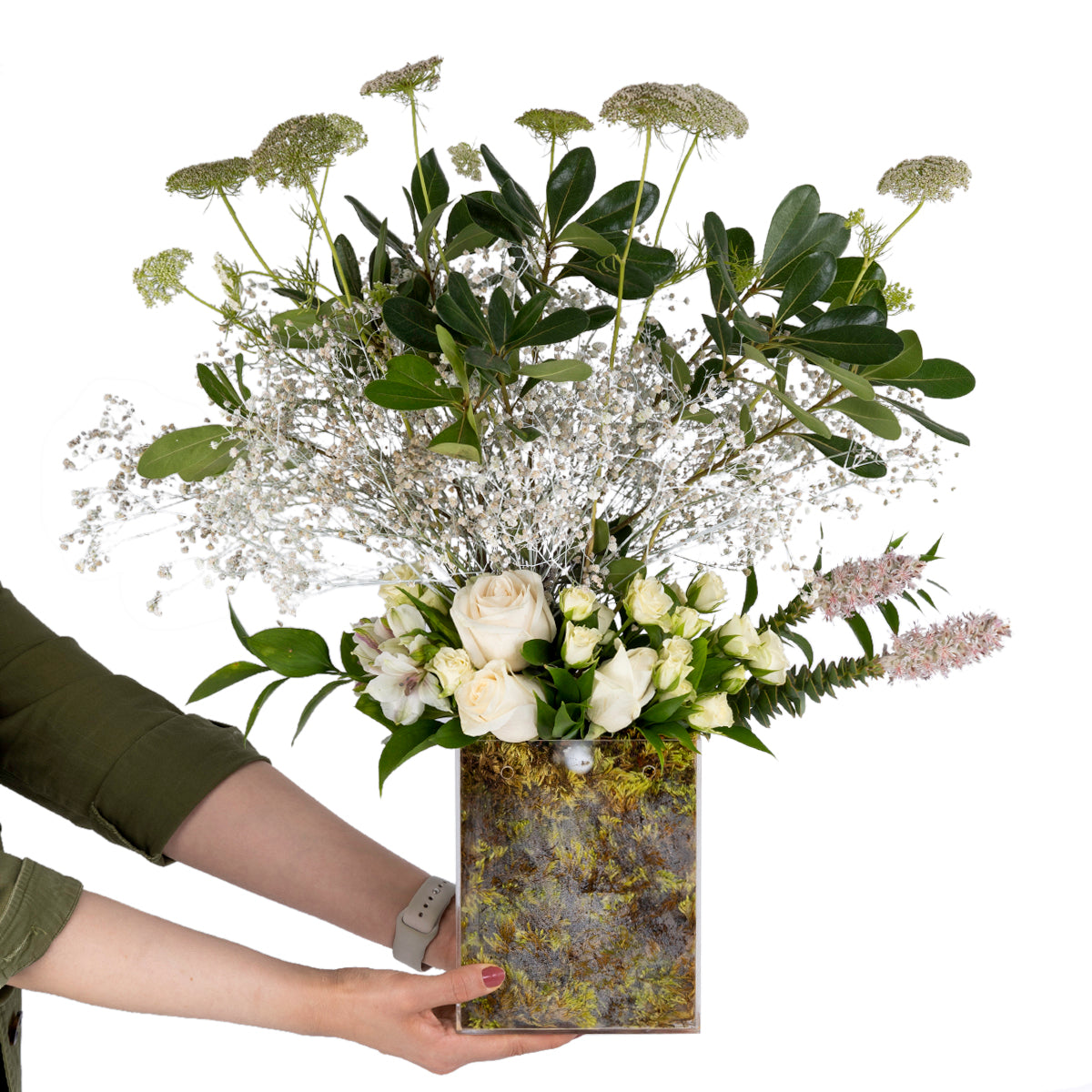 Elegant flower vase featuring fresh deferent types of white flowers