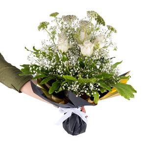 Elegant hand-tied bouquet featuring fresh white roses and baby flowers