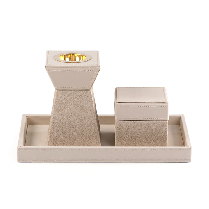 beige leather incense burner with a matching bakhour storage jar