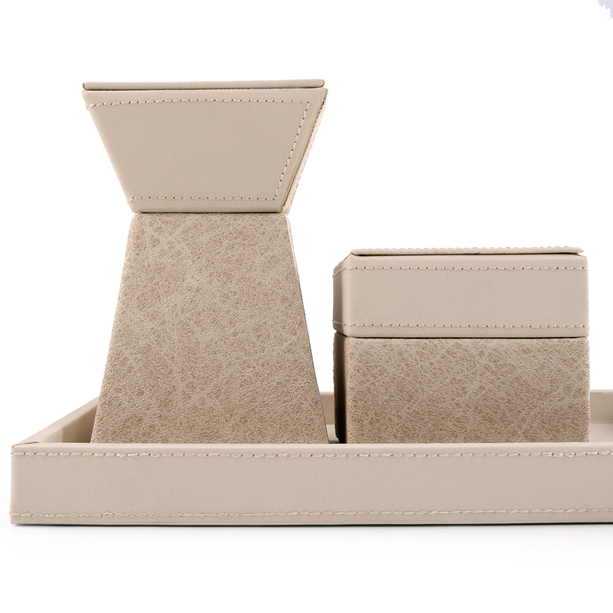 beige leather incense burner with a matching bakhour storage jar