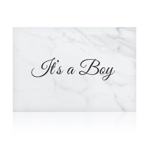 white marble new baby boy greeting card with the words 'It's a boy' written on it