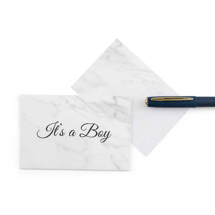 white marble new baby boy greeting card with the words 'It's a boy' written on it