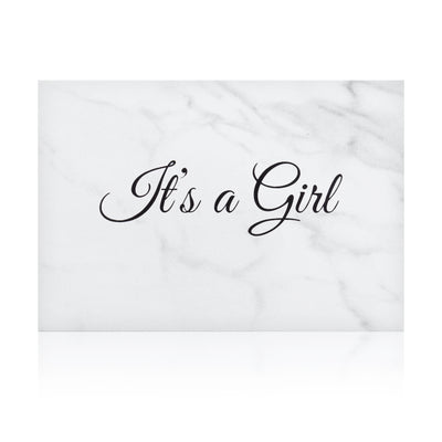 white marble new baby girl greeting card with the words 'It's a girl' written on it