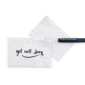 white marble greeting card for with the words 'get well soon' written on it