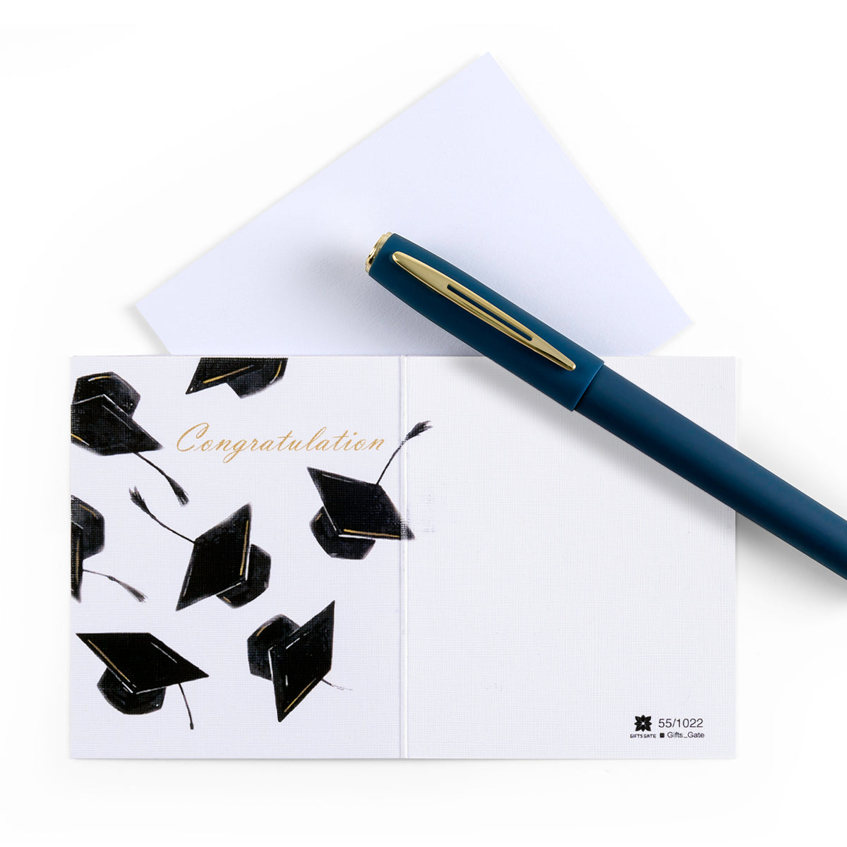 White graduation greeting card with the word ' Congratulations ' written on it