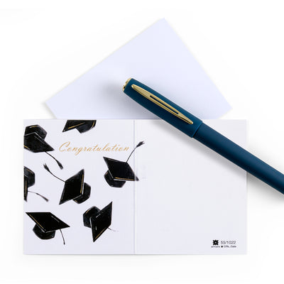White graduation greeting card with the word ' Congratulations ' written on it