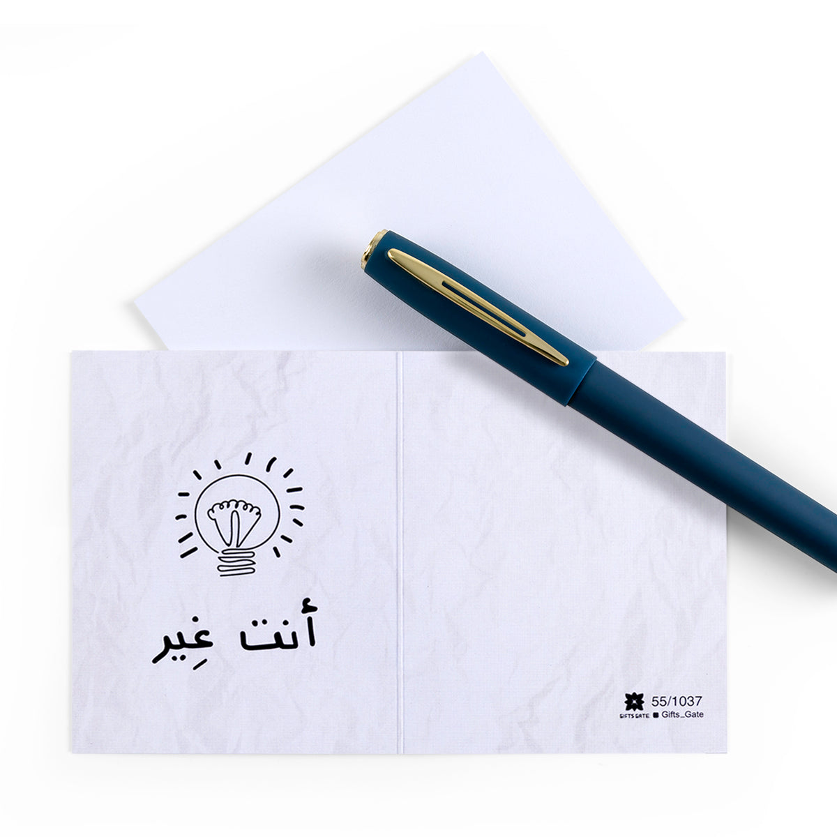 white greeting card with sentence أنت غير