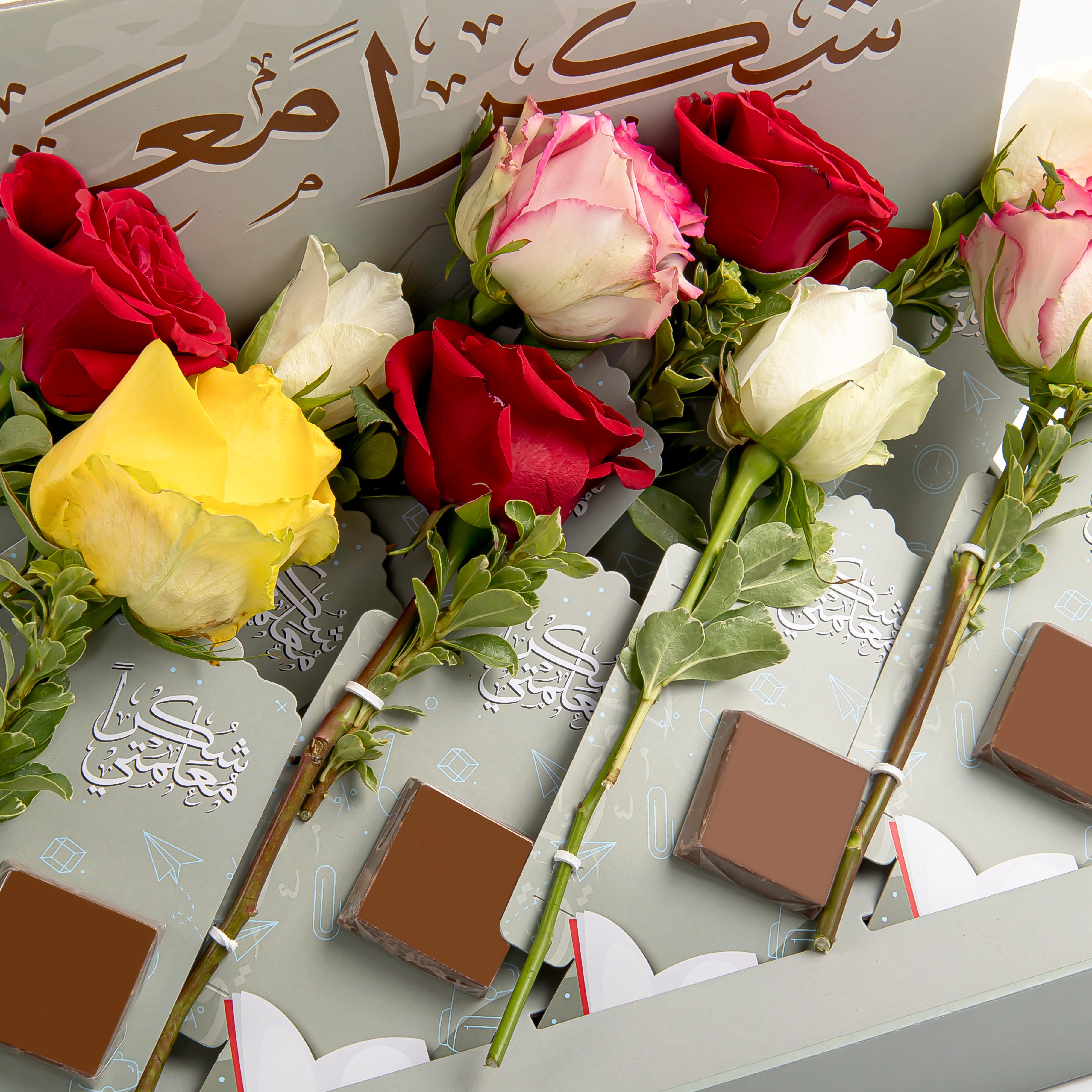 set of rose flowers with chocolate 