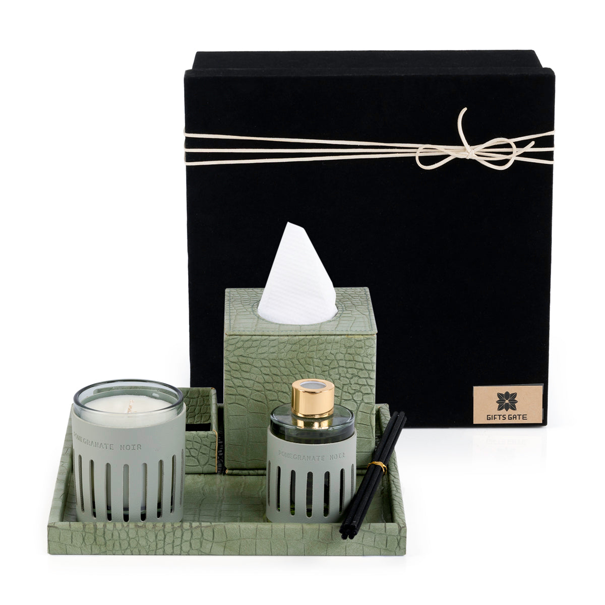 Green leather tray with matching tissue box, plate, candle, and diffuser