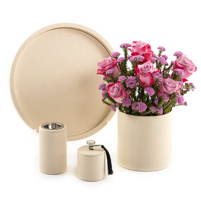 A white leather set includes circle tray, incense burner, jar, and flower vase