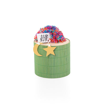 green decorated wicker gergean box with a customized name label