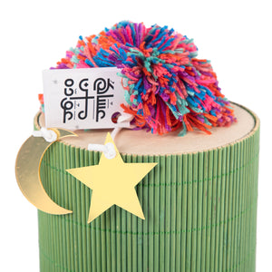 green decorated wicker gergean box with a customized name label