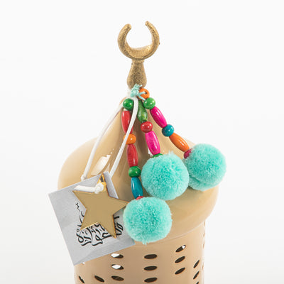 Decorated beige metal box with a customized name label 