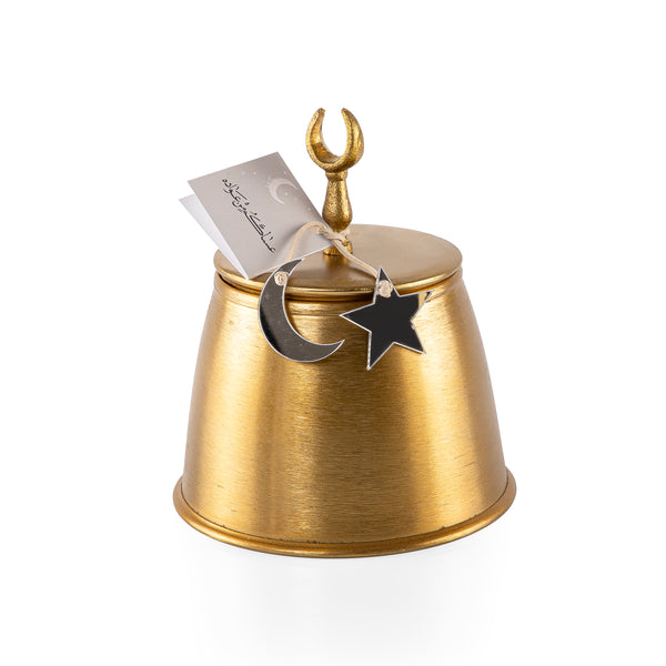Decorated gold metal box with a customized name label 