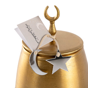 Decorated gold metal box with a customized name label 