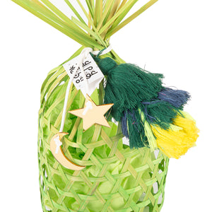 green decorated wicker gergean box with a customized name label