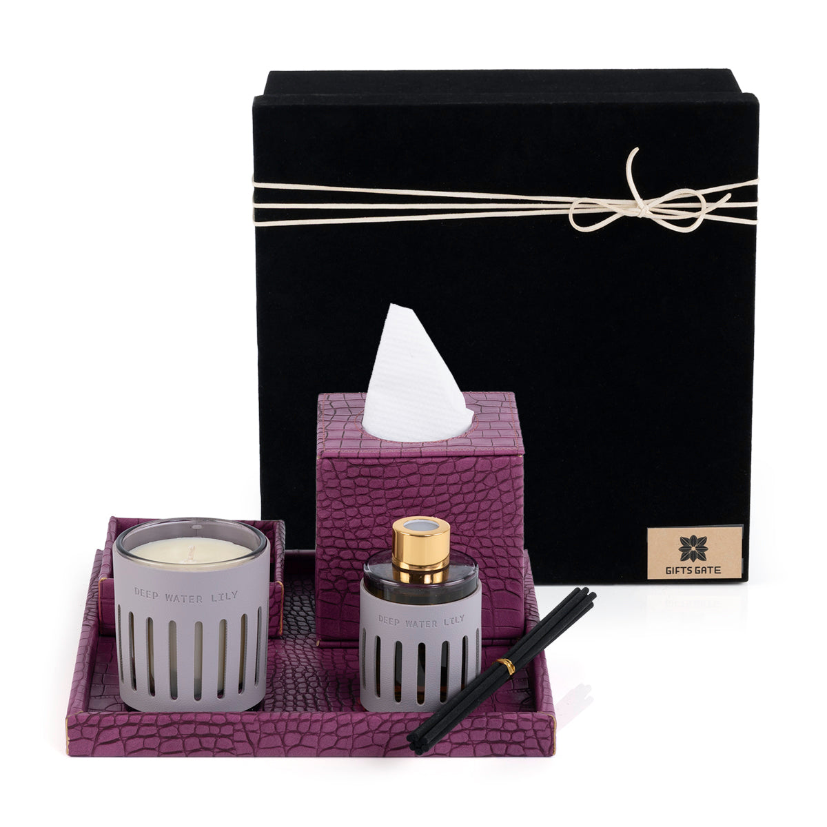 Purple leather tray with matching tissue box, plate, candle, and diffuser