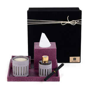 Purple leather tray with matching tissue box, plate, candle, and diffuser