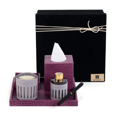 Purple leather tray with matching tissue box, plate, candle, and diffuser