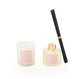 diffuser, candle, and five sticks