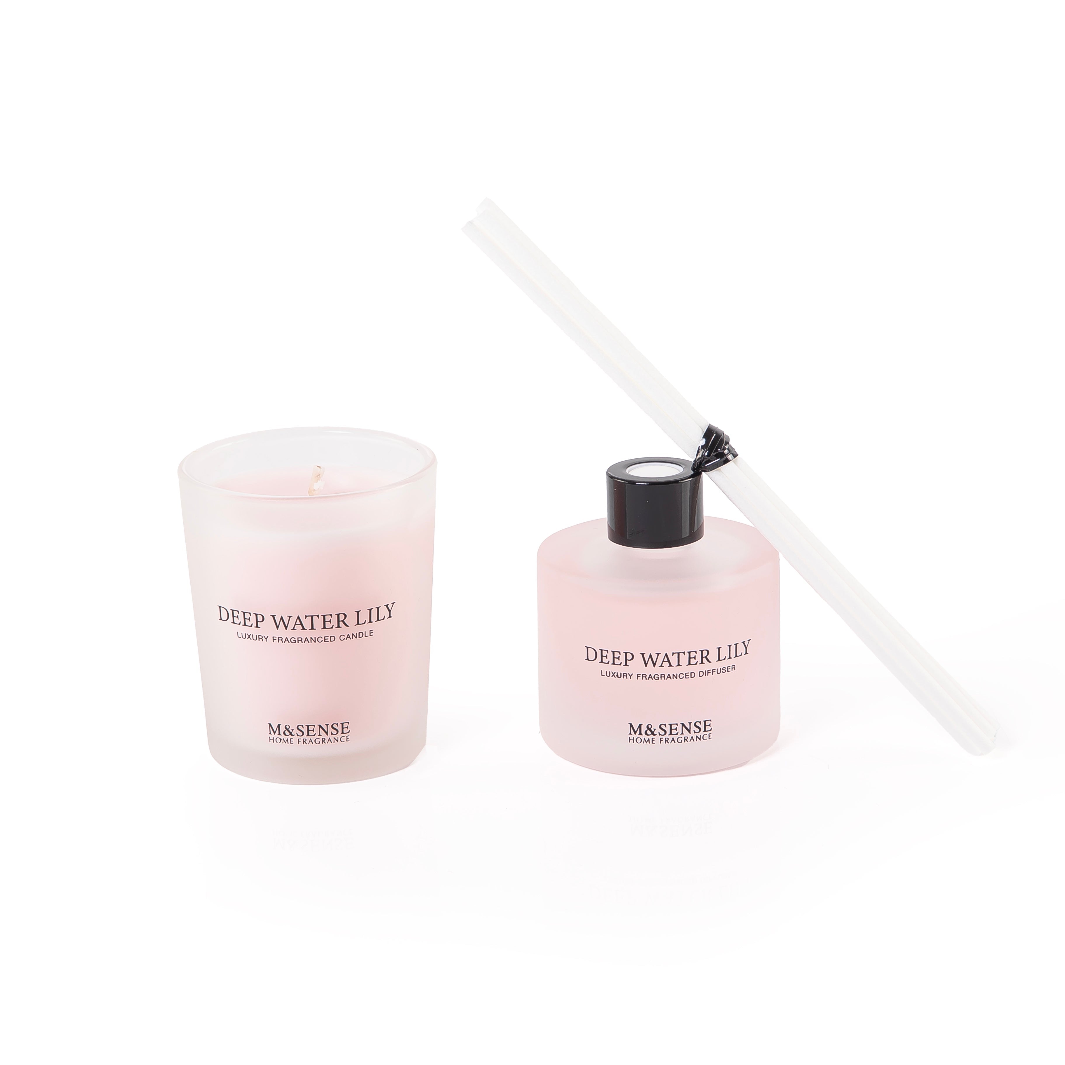 A diffuser, candle, and five sticks