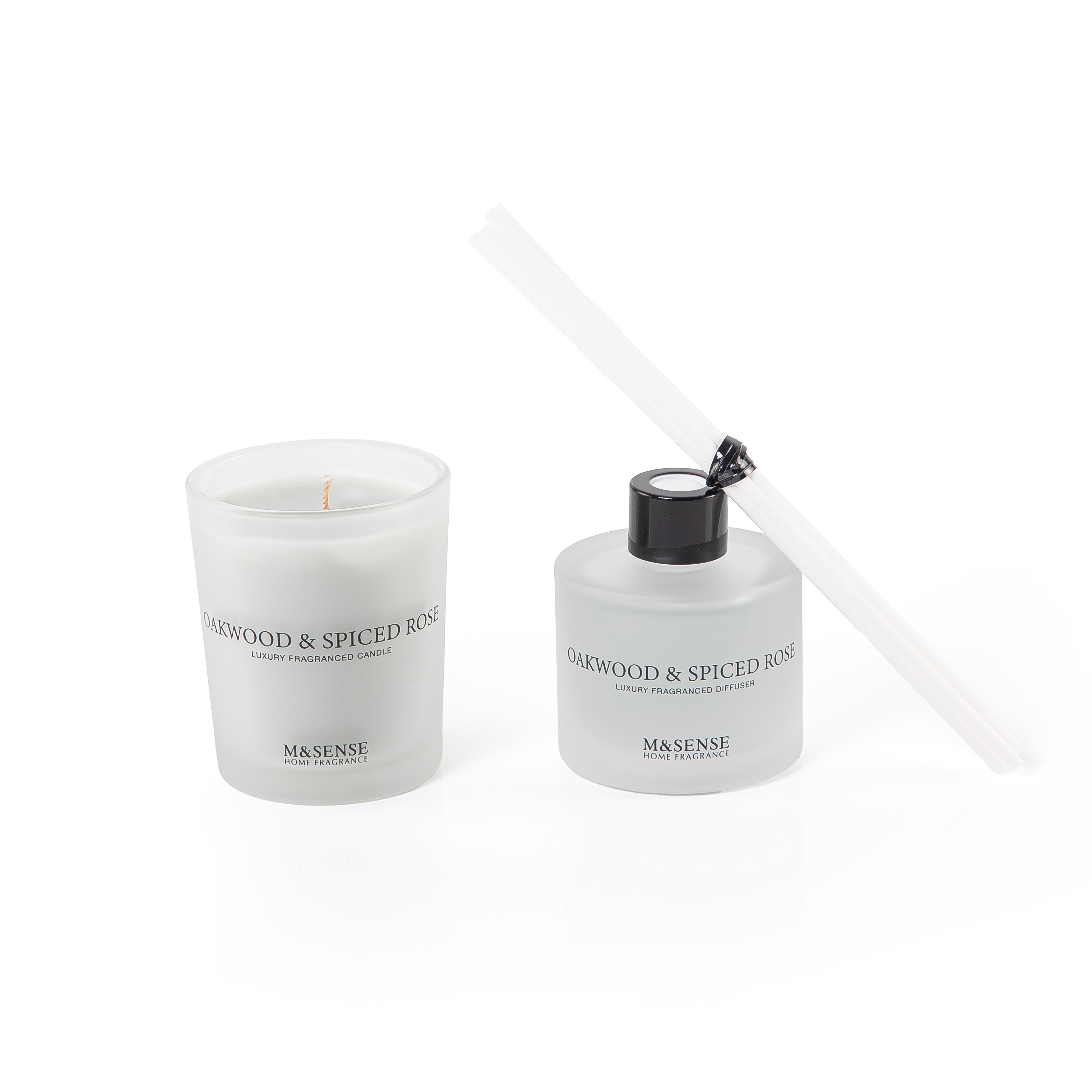 blue diffuser, candle, and five sticks