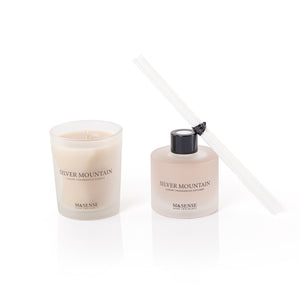 diffuser, candle, and five sticks